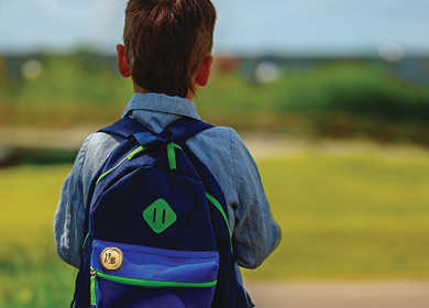 Child with backpack.