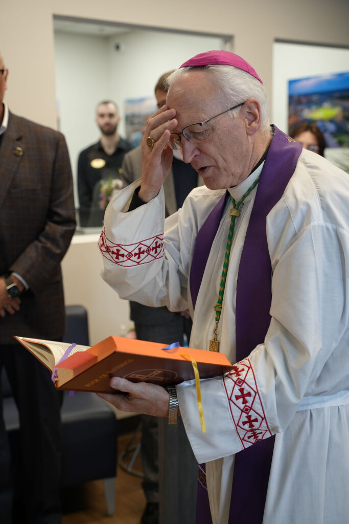 Most Reverend Earl Boyea Bishop of Lansing Blesses Notre Dame FCU Branch
