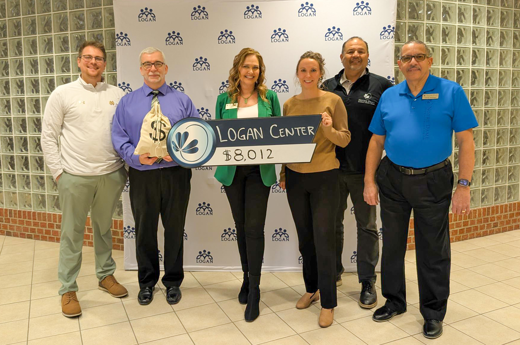 Logan Center Check Presentation