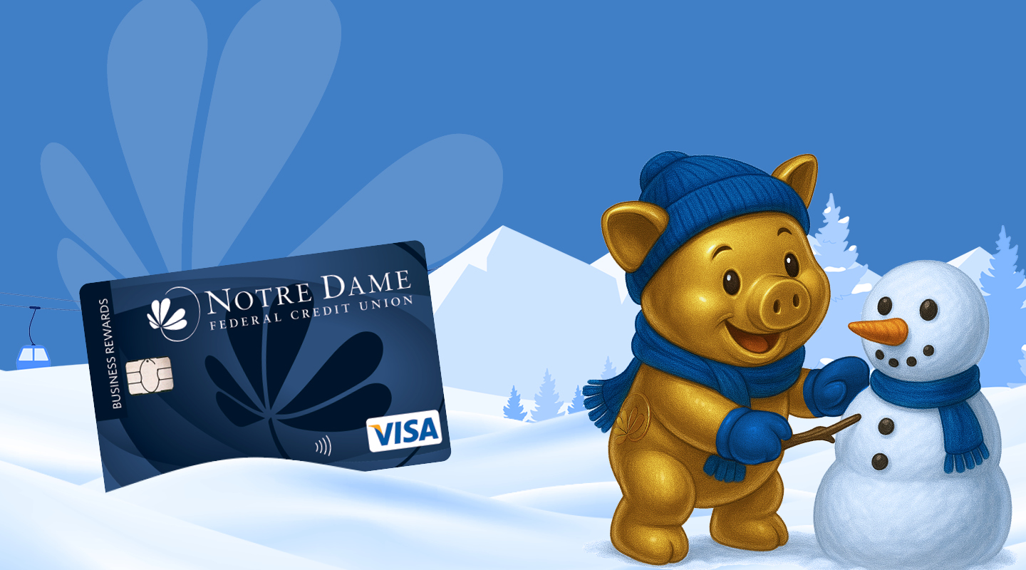 Image of a piggy bank building a snowman next to the business credit card