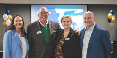 Executives from Notre Dame Federal Credit Union and United Catholic Financial Credit Union celebrating the voting for the union merger in Minnesota on March 18, 2026