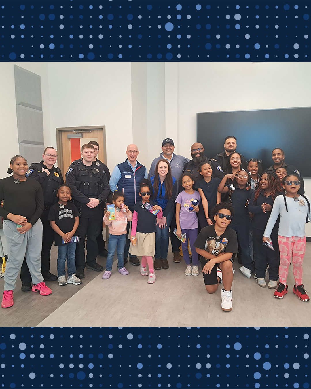 large group shot at cops and community event in march