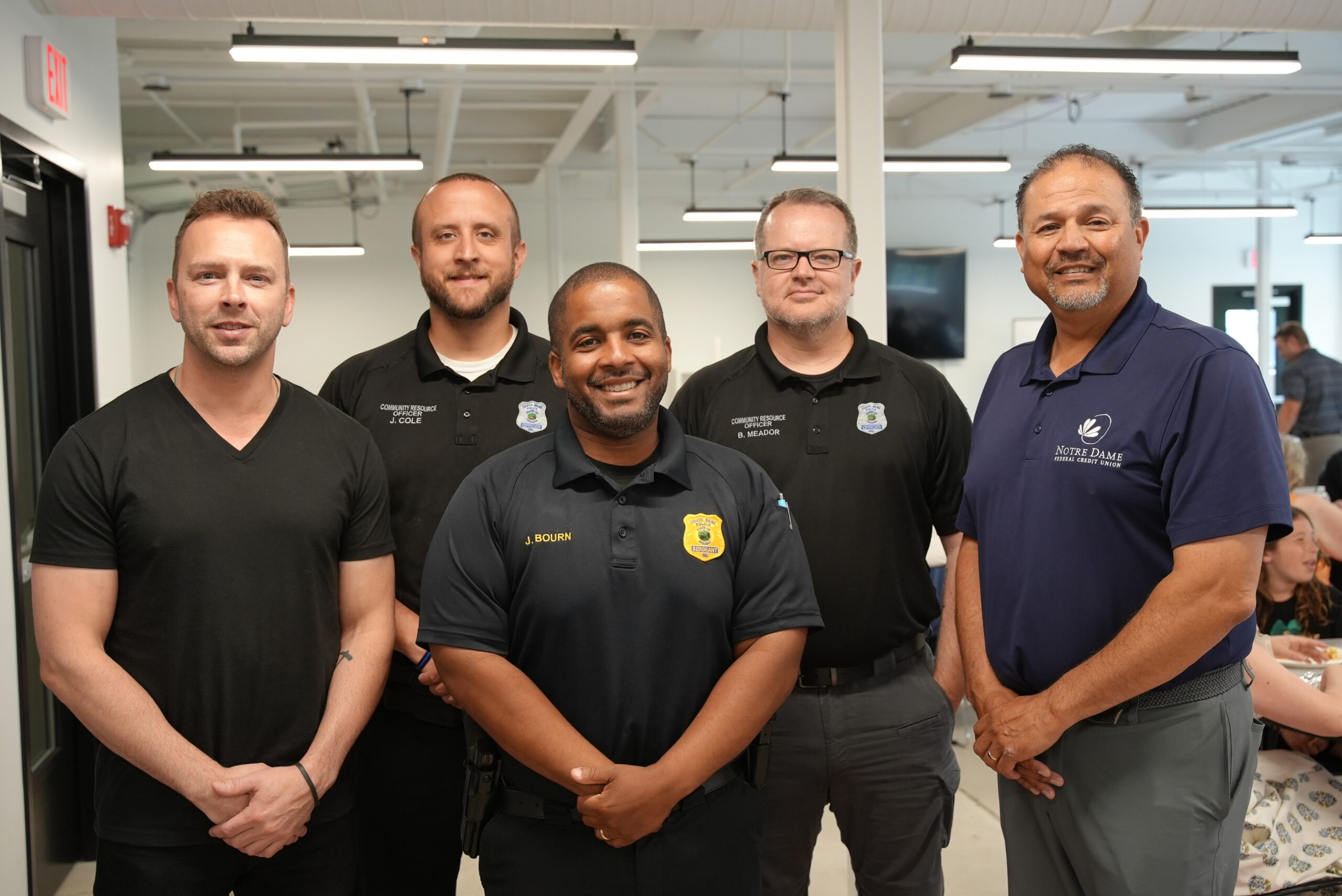 SBPD Officers posing for shot at event, 06/2025
