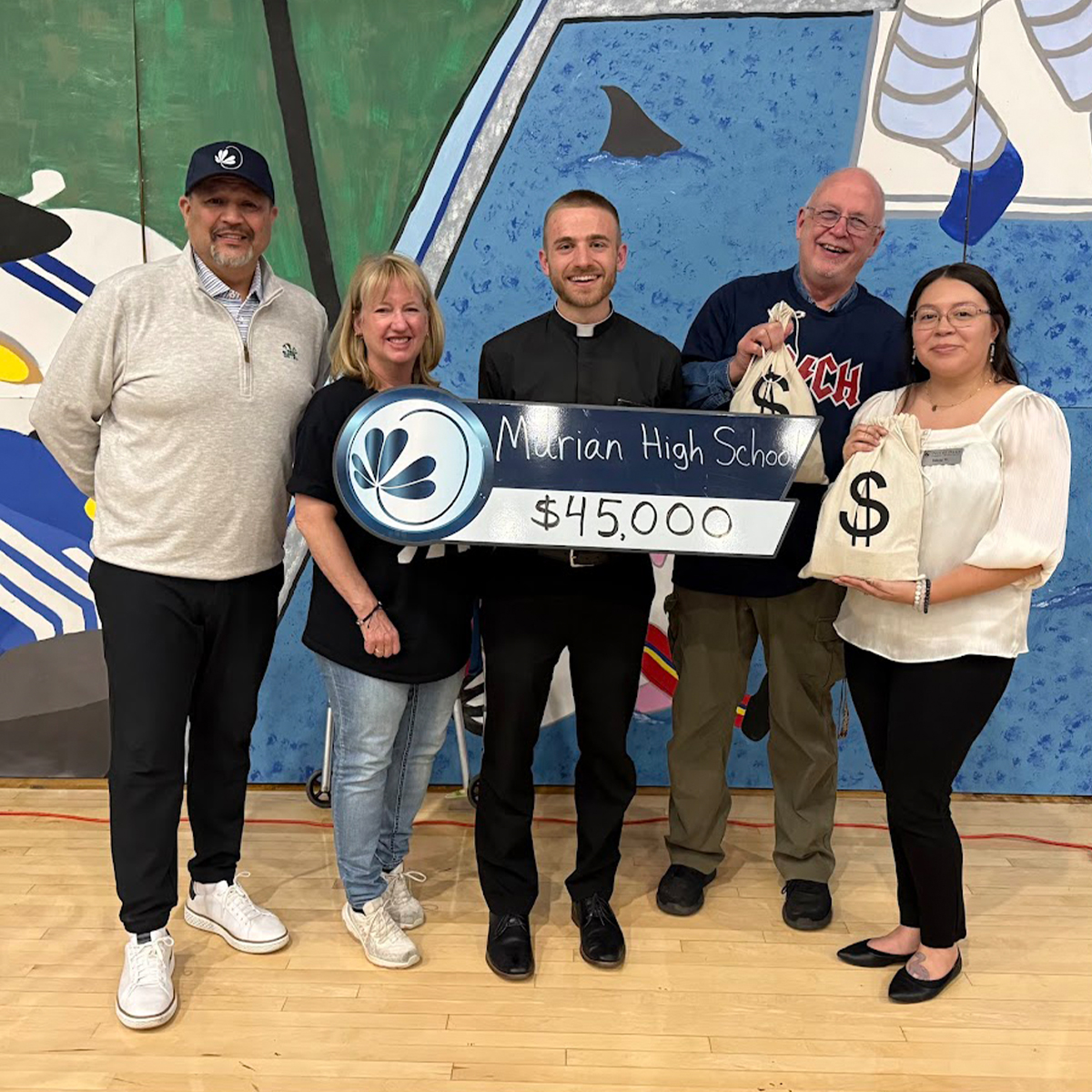 ELEVATE Donation Check Presentation