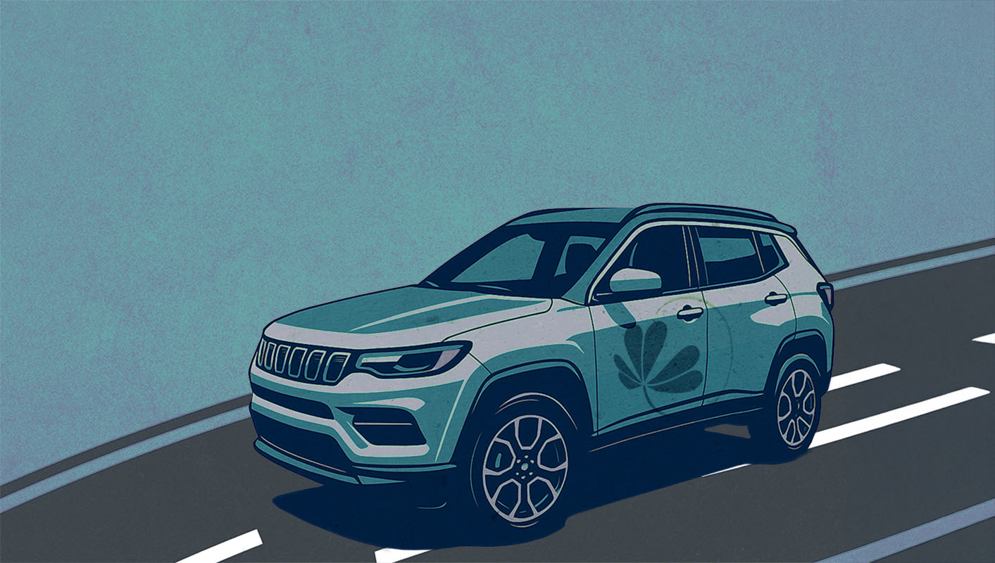 blue vehicle with shammy on open road